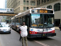 Bus #7598 at Washington and Wabash, working route #147 Outer Drive Express, on April 28, 2004.