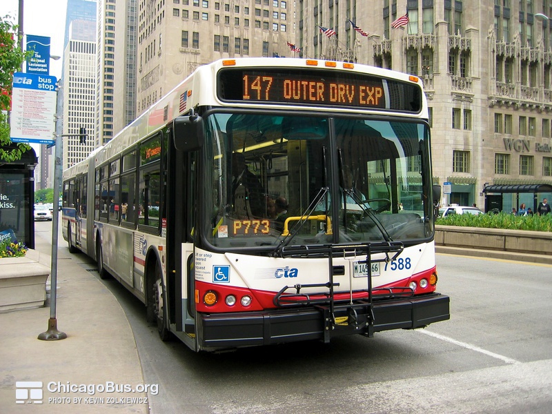 Bus #7588 at Michigan and Wrigley Building, working route #147 Outer Drive Express, on May 19, 2004.