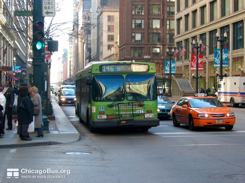 Bus #5811 at State and Washington, working route #146 Inner Drive/Michigan Express, on February 26, 2004.