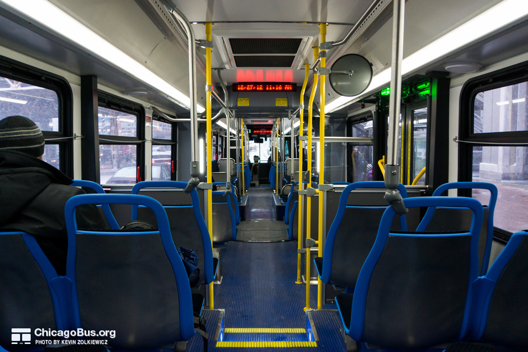 The interior of bus #4333, working route #6 Jackson Park Express, on December 27, 2012. Unlike the previous order of articulated buses, the large majority of the seating on the 4300-series is forward-facing.