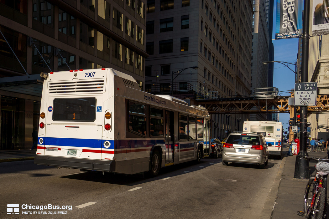 Bus #7907 at Jackson and Wells, working route #1 Bronzeville/Union Station, on July 18, 2014.