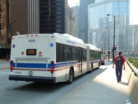 Bus #4049 at Wacker and Stetson, working route #123 Illinois Center/Union Express, on May 25, 2010.