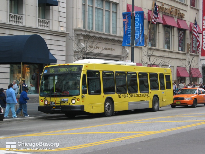 Bus #6637 at Chicago and Michigan, working route #66 Chicago, on November 22, 2003.