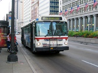 Bus #7324 at Michigan and Monroe, working route #6 Jackson Park Express, on August  5, 2003.