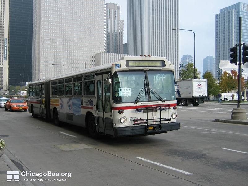 Bus #7373 at Michigan and Madison, working route #147 Outer Drive Express, on November 17, 2003.