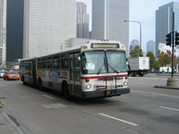 Bus #7373 at Michigan and Madison, working route #147 Outer Drive Express, on November 17, 2003.