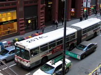 Bus #7396 at Jackson and Wells on March  9, 2004. Ex-King County Metro #2074.