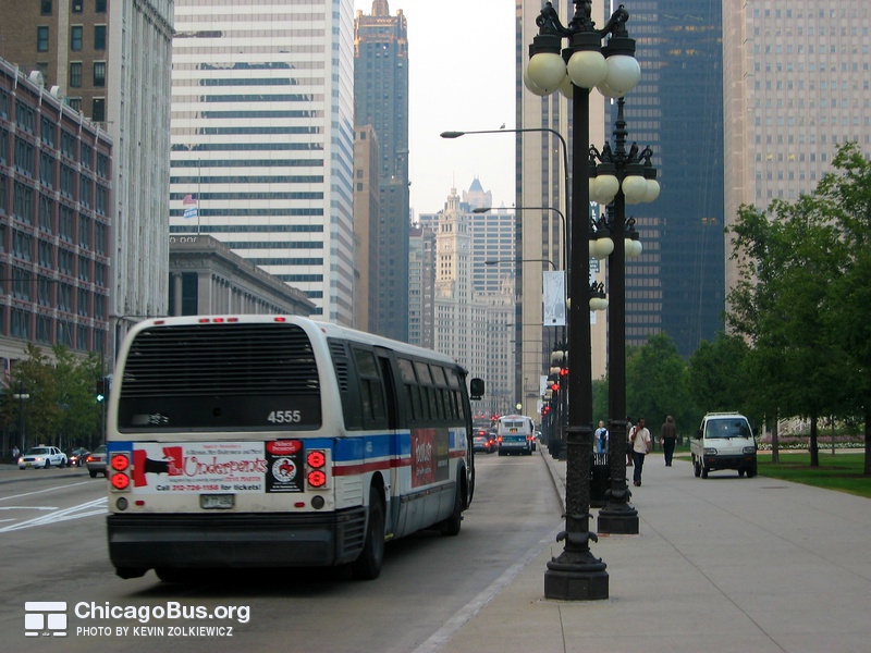 Bus #4555 at Michigan and Monroe, working route #143 Stockton/Michigan Express, on September 11, 2003.