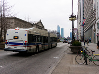 Bus #4306 at Michigan and Monroe, working route #J14 Jeffery Jump, on December 19, 2012.
