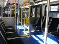 The interior of bus #4162 at State and Madison, working route #147 Outer Drive Express, on July 18, 2010. Numbers 4149-2207 switched to a longitudinal seating arrangement with Aries 4MA seats.