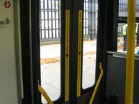 The 1000-series buses feature "easy-touch" rear doors that open automatically through the use of motion sensors.